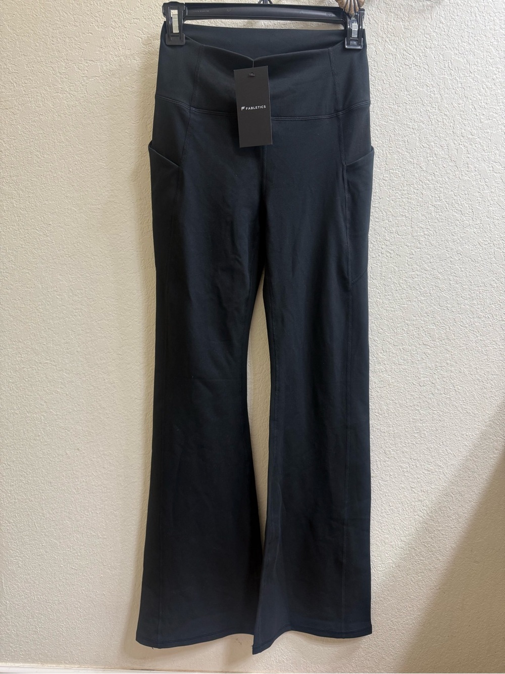 Fabletics Black High-Rise Flare Leggings with Side Pockets